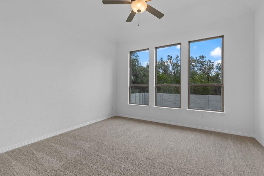 Primary Bedroom with elevated ceiling Primary Bedroom with elevated ceiling