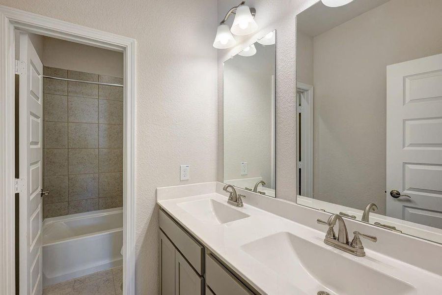 The Mockingbird II- Dual Vanities in Hall Bath. The Mockingbird II- Dual Vanities in Hall Bath.