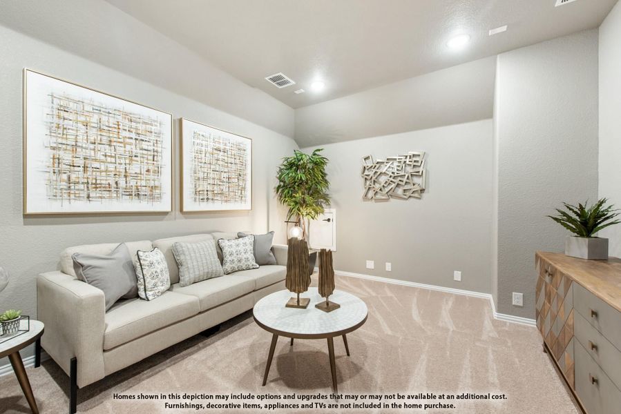 Living room with beige sofa, round coffee table, carpet flooring, and framed wall art on gray walls Living room with beige sofa, round coffee table, carpet flooring, and framed wall art on gray walls