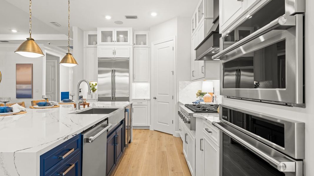 Furnished interior view inside a new home in Esplanade by the Islands, Naples (Image 10).