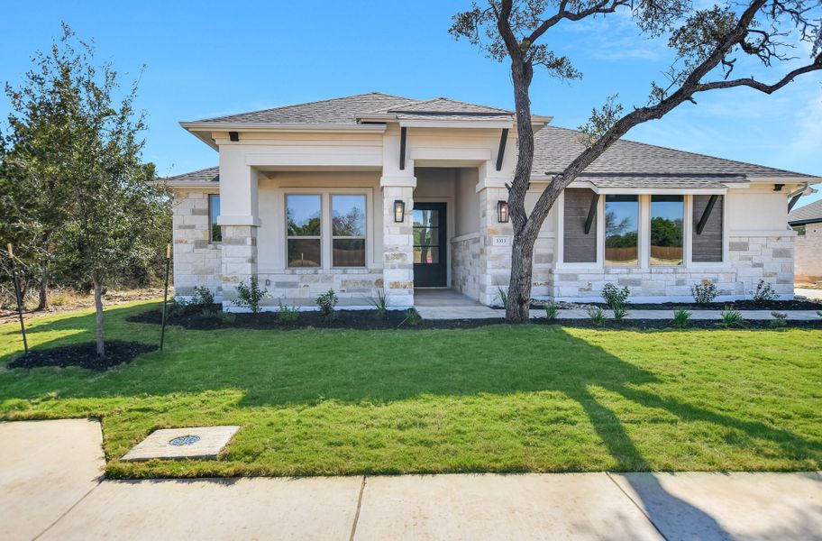 Representative exterior photo of a completed home built from the Sapphire by Giddens Homes in Riverstone, Georgetown, TX (Image 26).