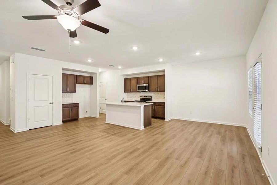 Sample Photo: Family Room & Kitchen Sample Photo: Family Room & Kitchen