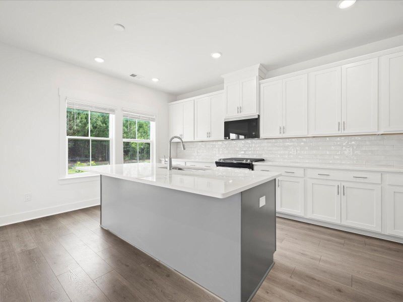 Furnished interior view inside a new home in The Coves at Lakes of Cane Bay, Summerville (Image 8).