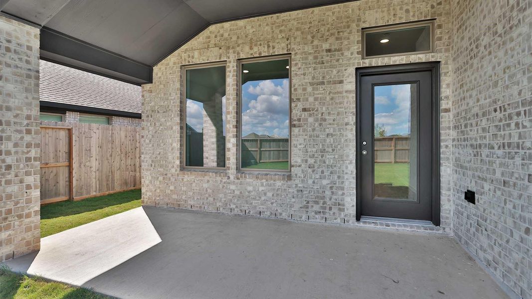 Exterior details and patio area of a home in Candela South, Richmond (Image 2).