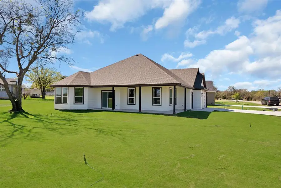 Exterior details and patio area of a home in , Runaway Bay (Image 18).