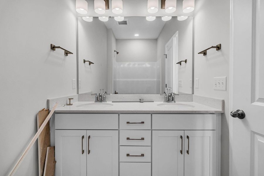 Furnished interior view inside a new home in Tidewater at Lakes of Cane Bay, Summerville (Image 11).