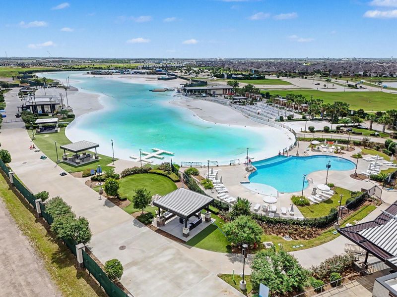 The community amenity center features a resort-style pool, lagoon access, shaded seating areas, and beautifully maintained grounds. The community amenity center features a resort-style pool, lagoon access, shaded seating areas, and beautifully maintained grounds.