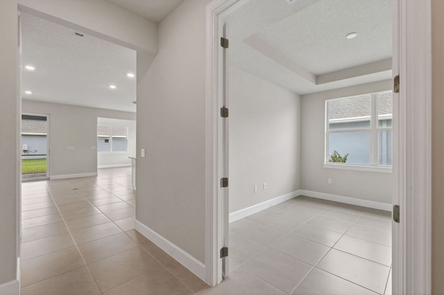 Spacious, unfurnished interior of a new home in Del Webb Tradition, Port St. Lucie (Image 53).