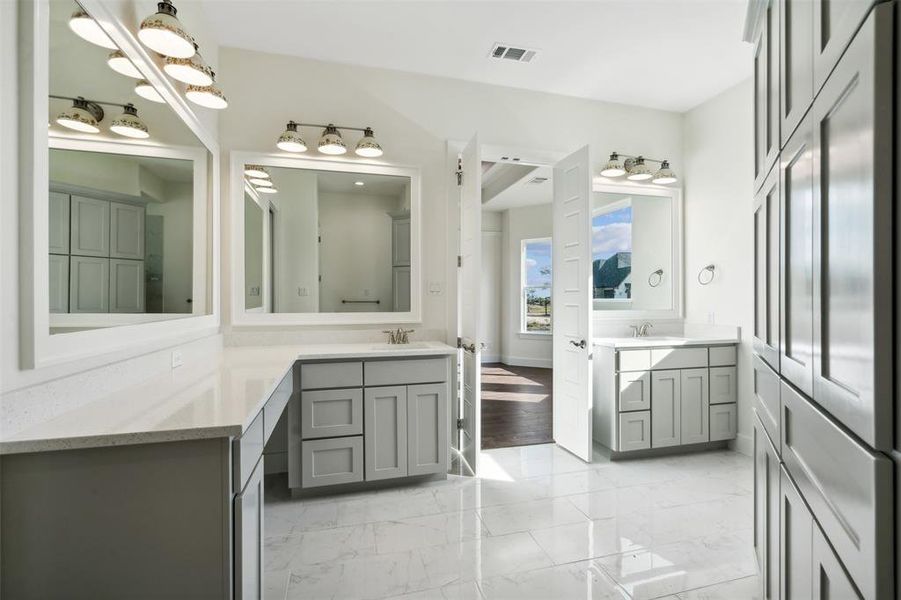 Bathroom featuring vanity and hardwood / wood-style flooring