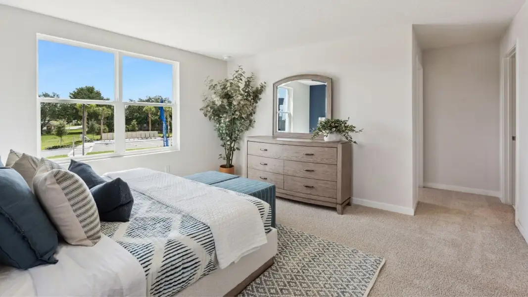 Furnished interior view inside a new home in Fish Lake Cove, Kissimmee (Image 9).