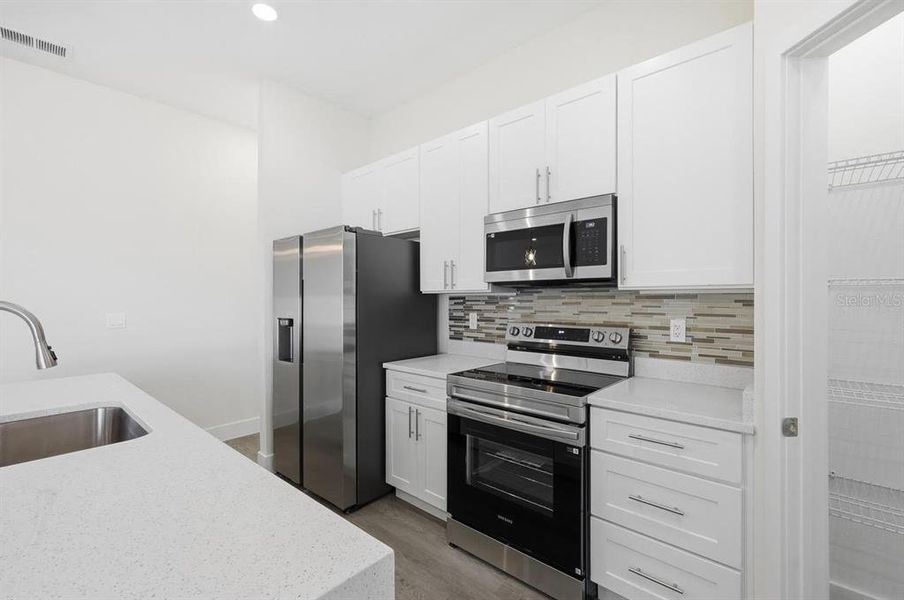 Furnished interior view inside a new home in , Ocala (Image 8).