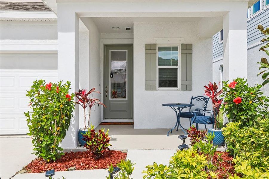 Exterior details and patio area of a home in Waterset Garden Series, Apollo Beach (Image 34).
