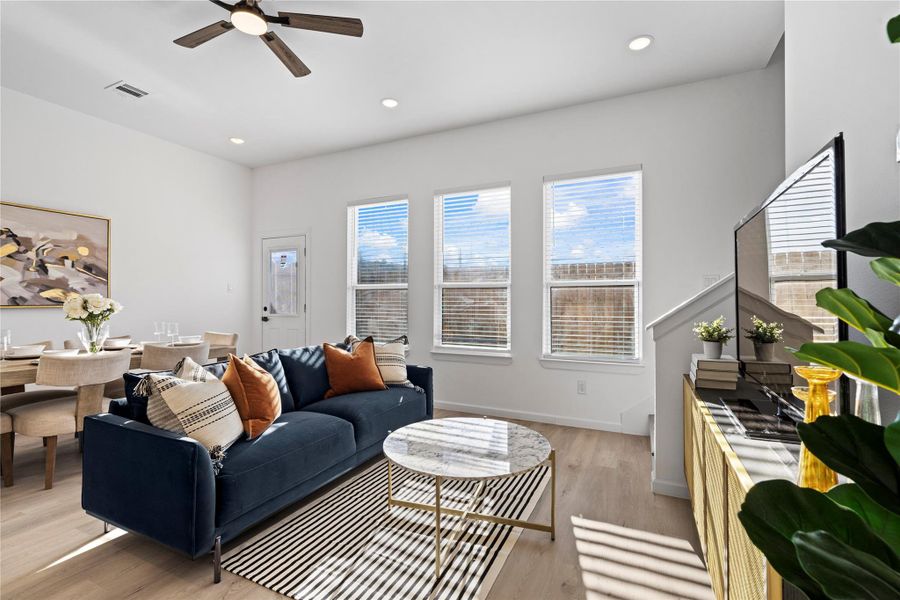 Wall of windows at the back of the home brings in plenty of natural light and connects indoor living to your private backyard. Wall of windows at the back of the home brings in plenty of natural light and connects indoor living to your private backyard.