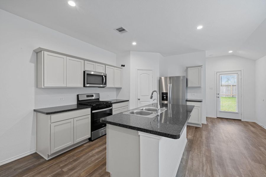 Great space in the kitchen for chef prepared meals.  Island adds lots of counter space.