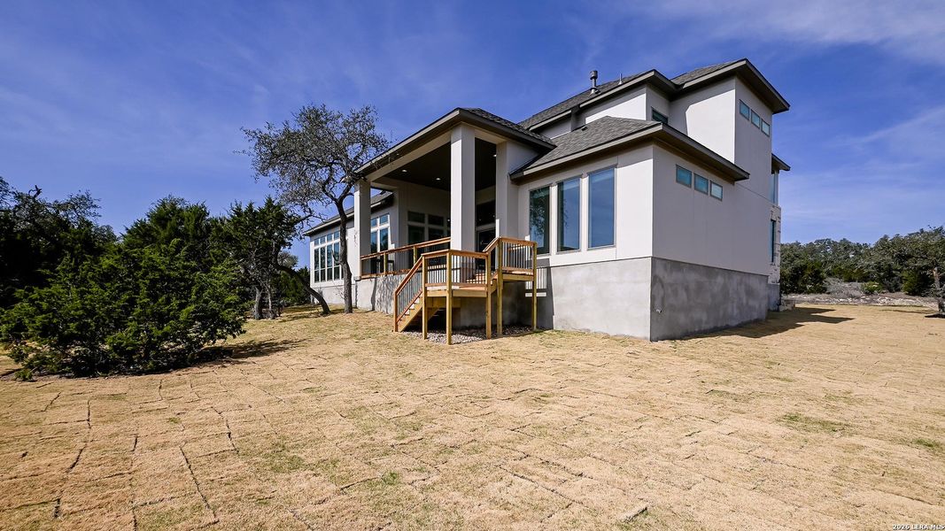 Exterior details and patio area of a home in Johnson Ranch, Bulverde (Image 4).