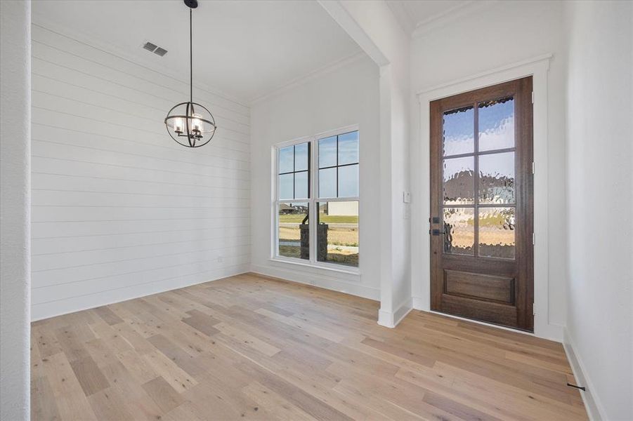 Entry, sitting room or Den