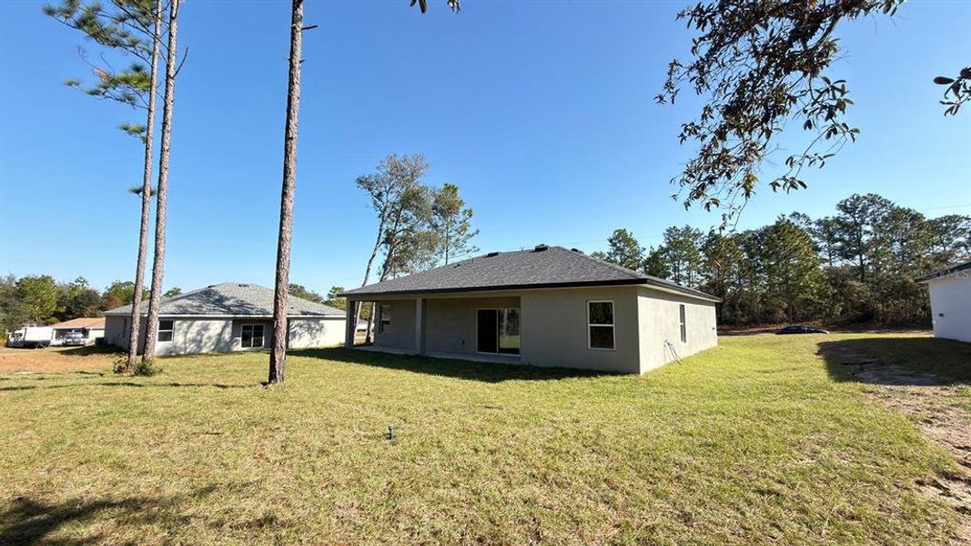 Exterior details and patio area of a home in , Citrus Springs (Image 22).