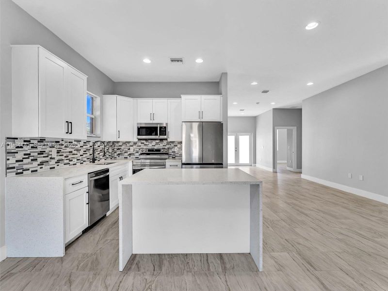 Furnished interior view inside a new home in , Fort Pierce (Image 3).