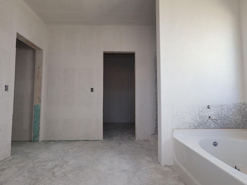 In-progress construction of a new home in Cascades at Onion Creek, Austin, TX (Image 4).