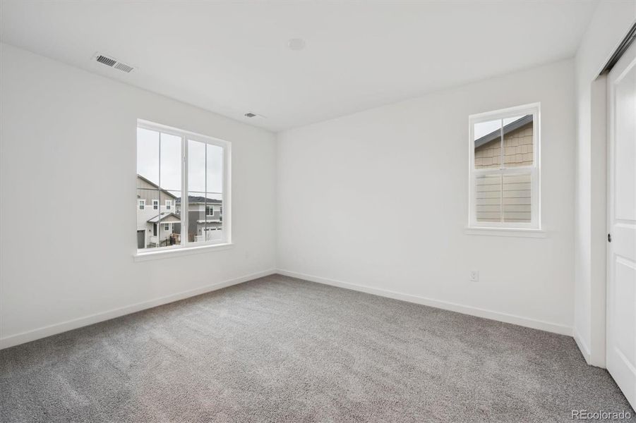 Spacious, unfurnished interior of a new home in Crossway at Second Creek, Commerce City (Image 18).