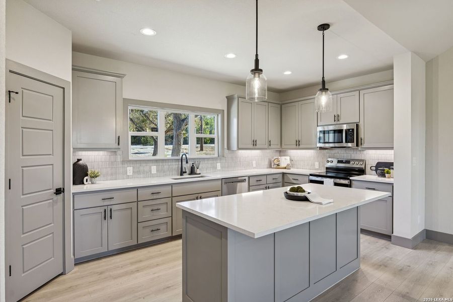 Furnished interior view inside a new home in , Fischer (Image 11).