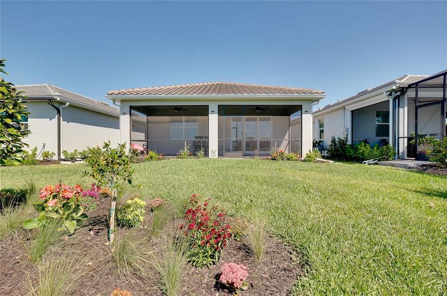 Exterior details and patio area of a home in BeachWalk by Manasota Key, Englewood (Image 35).