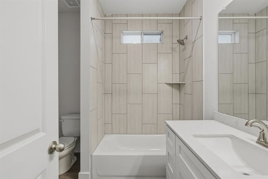 Representative furnished interior of a home built from the Oliver 2015 S TLT by Saratoga Homes in Lakeside at Tessera on Lake Travis, Lago Vista (Image 12).