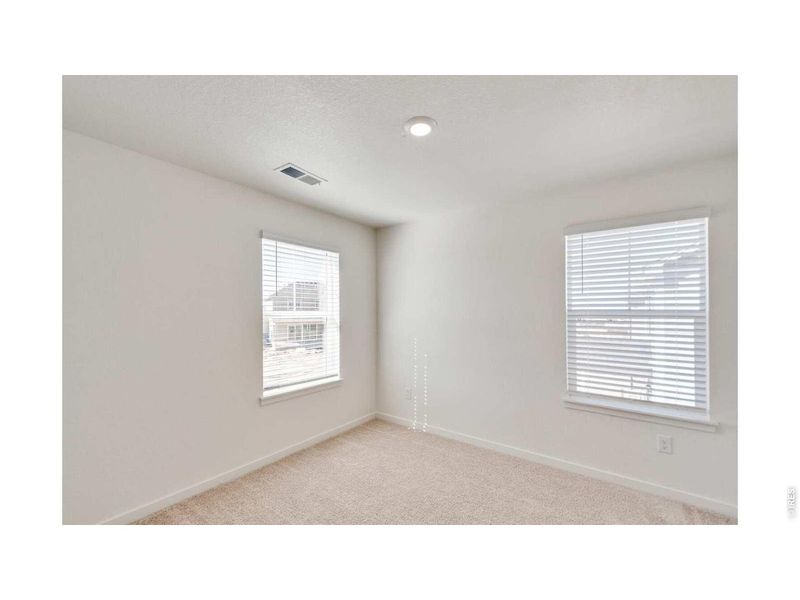 Spacious, unfurnished interior of a new home in Prairie Song, Windsor (Image 16).