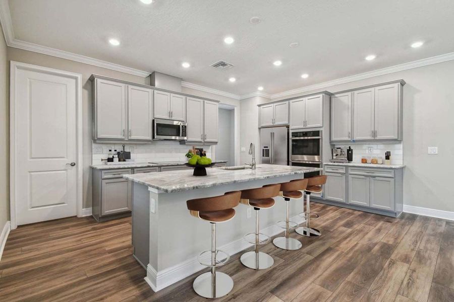 Representative furnished interior of a home built from the Sawgrass by William Ryan Homes in The Sanctuary – Royal Collection, Punta Gorda (Image 16).