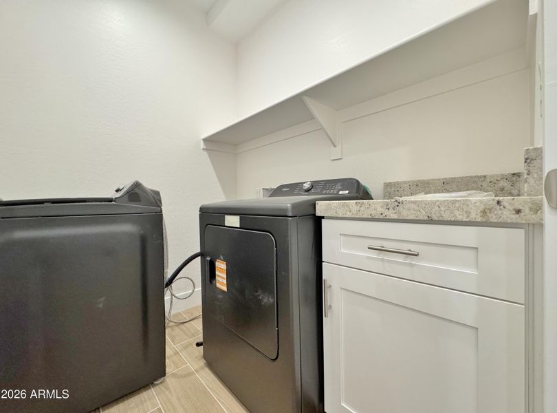 Indoor utility room w/ washer & dryer Indoor utility room w/ washer & dryer