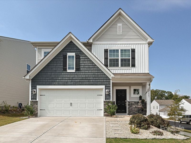 Front exterior of a new home in , Lancaster, SC, highlighting curb appeal (Image 1). Front exterior of a new home in , Lancaster, SC, highlighting curb appeal (Image 1).