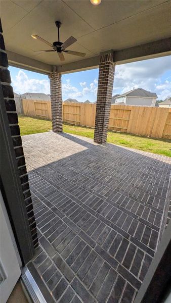 Exterior details and patio area of a home in Artavia, Conroe (Image 27).