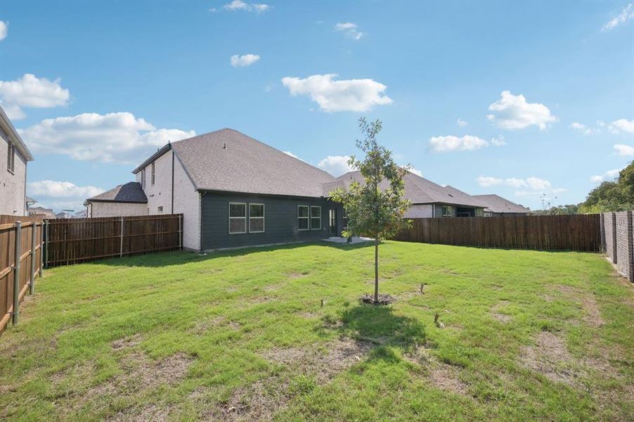 Front exterior of a new home in Windmore, Princeton, TX, highlighting curb appeal (Image 23).