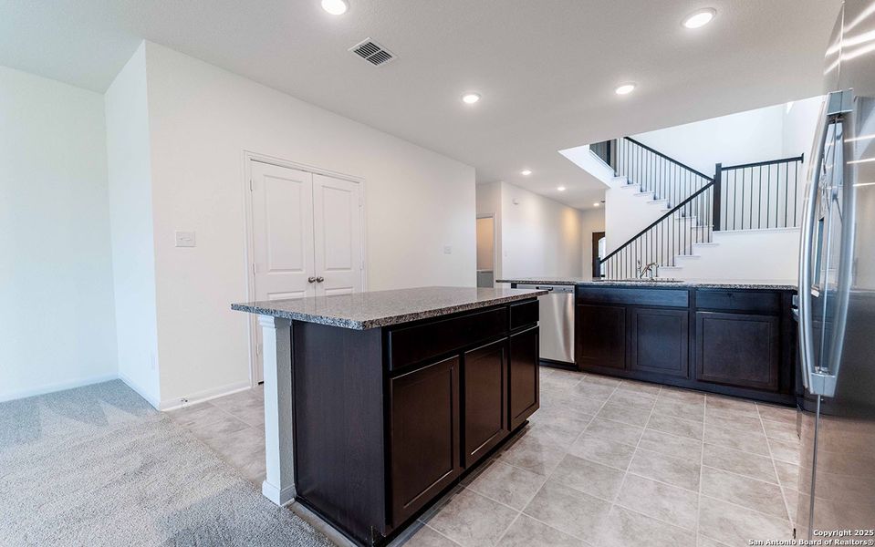 Furnished interior view inside a new home in Hunter's Ranch, San Antonio (Image 3).