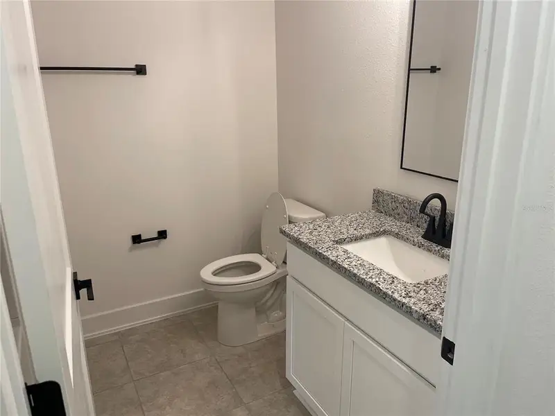 Furnished interior view inside a new home in Harmony Central, St. Cloud (Image 4).