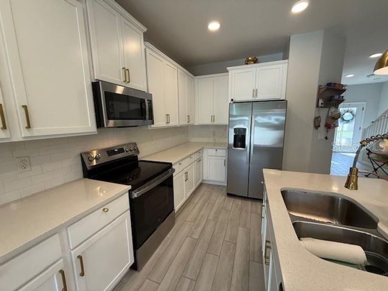 Furnished interior view inside a new home in , Winter Garden (Image 50).