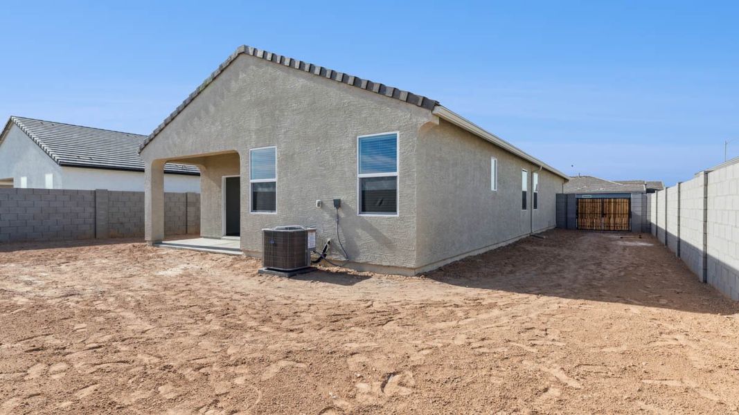 Exterior details and patio area of a home in Radiance at Superstition Vistas, Apache Junction (Image 13). Exterior details and patio area of a home in Radiance at Superstition Vistas, Apache Junction (Image 13).