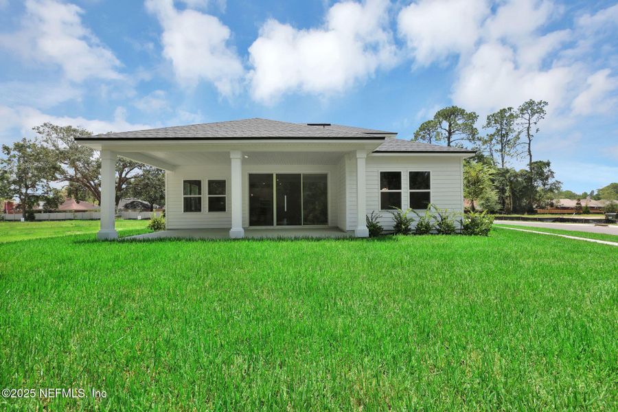 Exterior details and patio area of a home in Creighton Pointe, Fleming Island (Image 3).