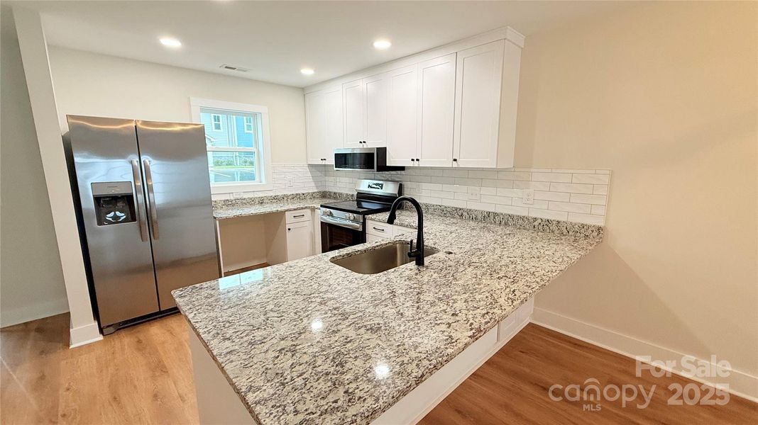 Furnished interior view inside a new home in , Morganton (Image 9). Furnished interior view inside a new home in , Morganton (Image 9).