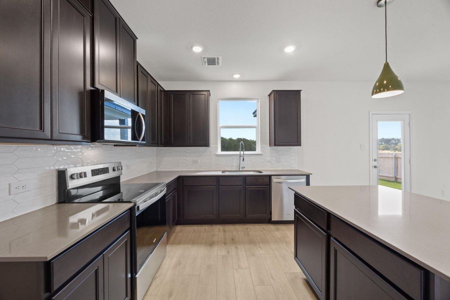 Furnished interior view inside a new home in Retreat at San Gabriel, Georgetown (Image 12). Furnished interior view inside a new home in Retreat at San Gabriel, Georgetown (Image 12).