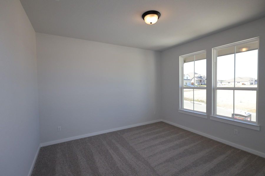 Spacious, unfurnished interior of a new home in Lariat, Liberty Hill (Image 26).