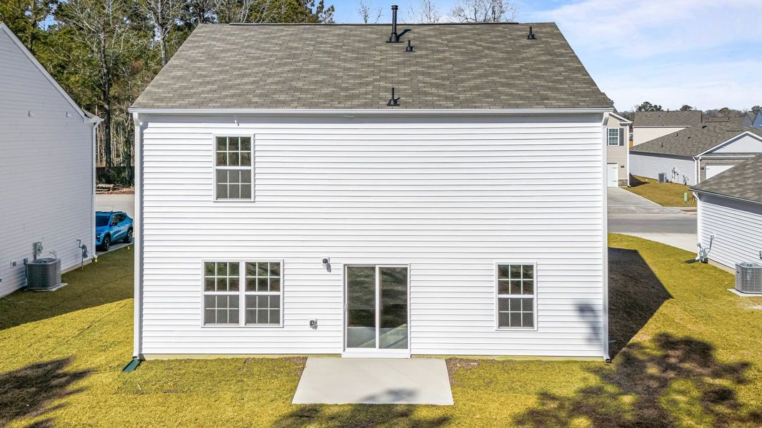 Exterior details and patio area of a home in Madeline Farm, New Bern (Image 4).
