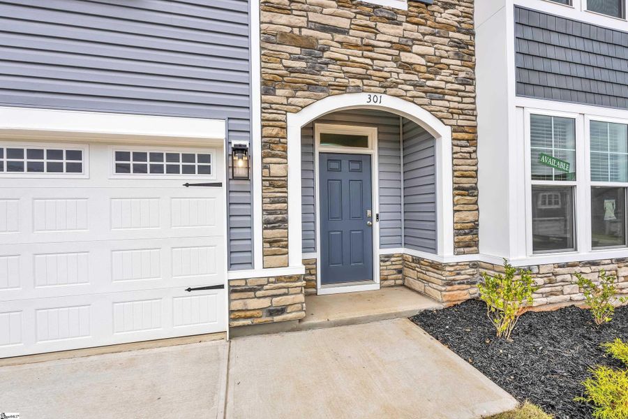 Exterior details and patio area of a home in Sedona, Greenville (Image 17).