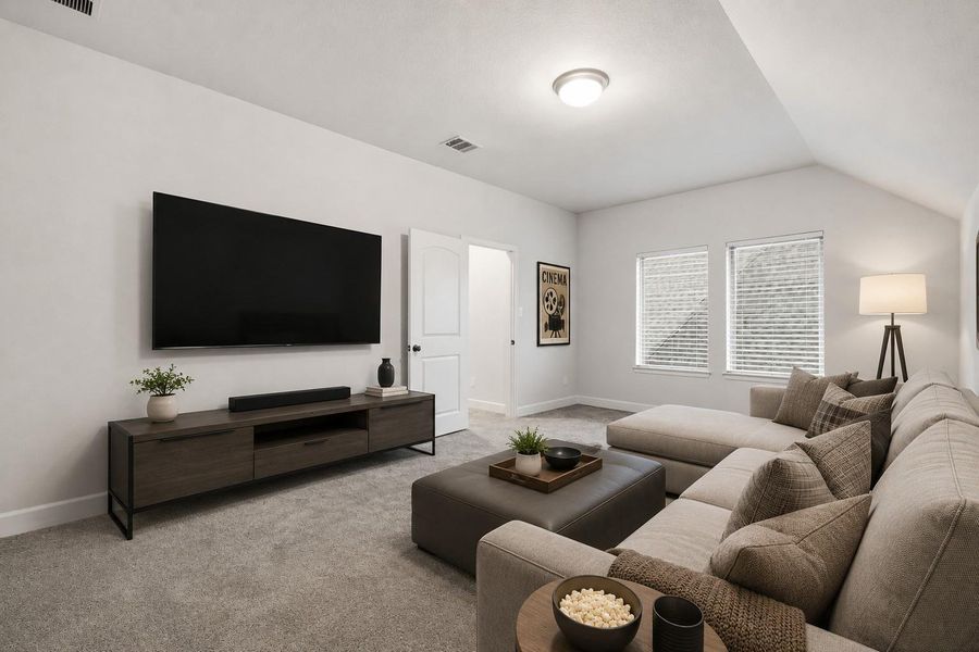 This cozy virtually staged media room is brightened by natural light from two windows, perfect for relaxing or entertaining. This cozy virtually staged media room is brightened by natural light from two windows, perfect for relaxing or entertaining.