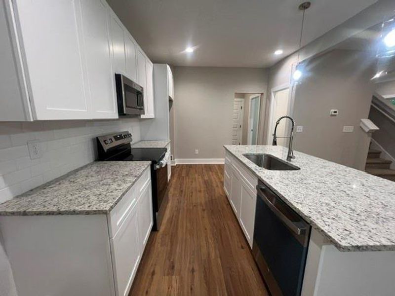 Furnished interior view inside a new home in , Mount Airy (Image 9).