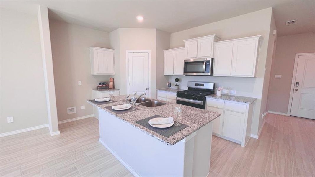 Kitchen - All Home and community information, including pricing, included features, terms, availability and amenities, are subject to change at any time without notice or obligation. All Drawings, pictures, photographs, video, square footages, floor plans, elevations, features, colors and sizes are approximate for illustration purposes only and will vary from the homes as built.