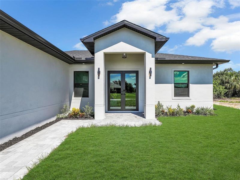Exterior details and patio area of a home in , Cape Coral (Image 25).
