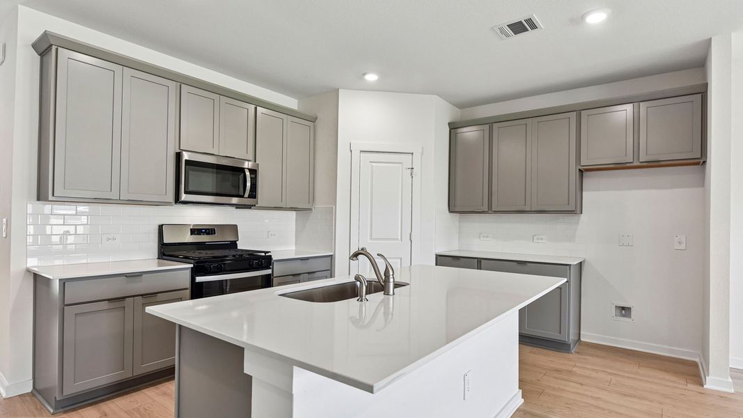 Furnished interior view inside a new home in Monarch Ranch, Manor (Image 9).