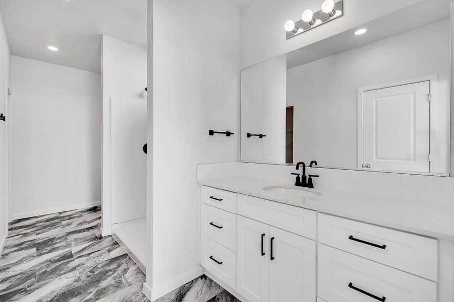 Representative furnished interior of a home built from the Stratton by Baessler Homes in Hudson Hills, Hudson (Image 12).