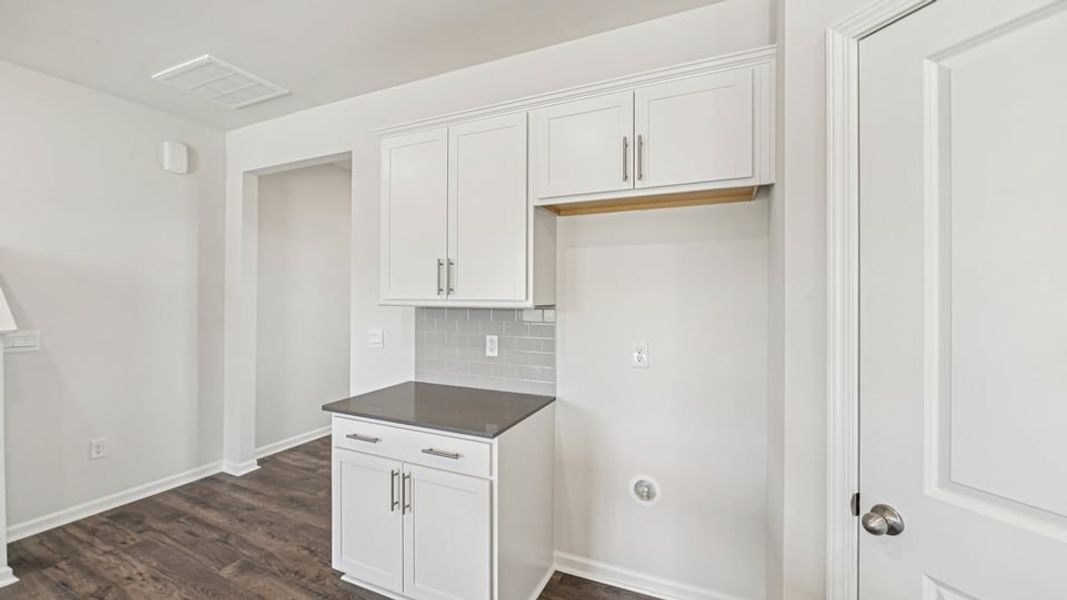 Furnished interior view inside a new home in Shahbain Reserve, Raeford (Image 6).